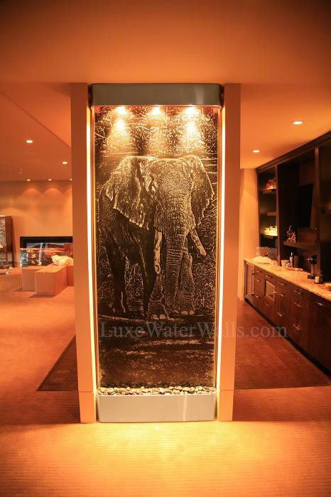 wall fountain with elephant etched