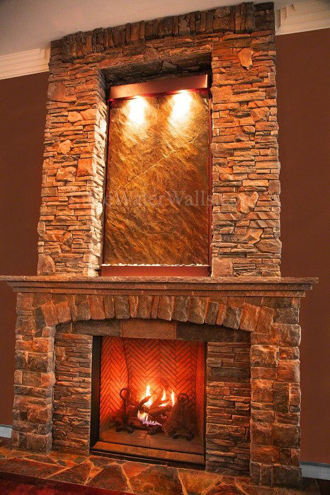 wall water fountain above fireplace